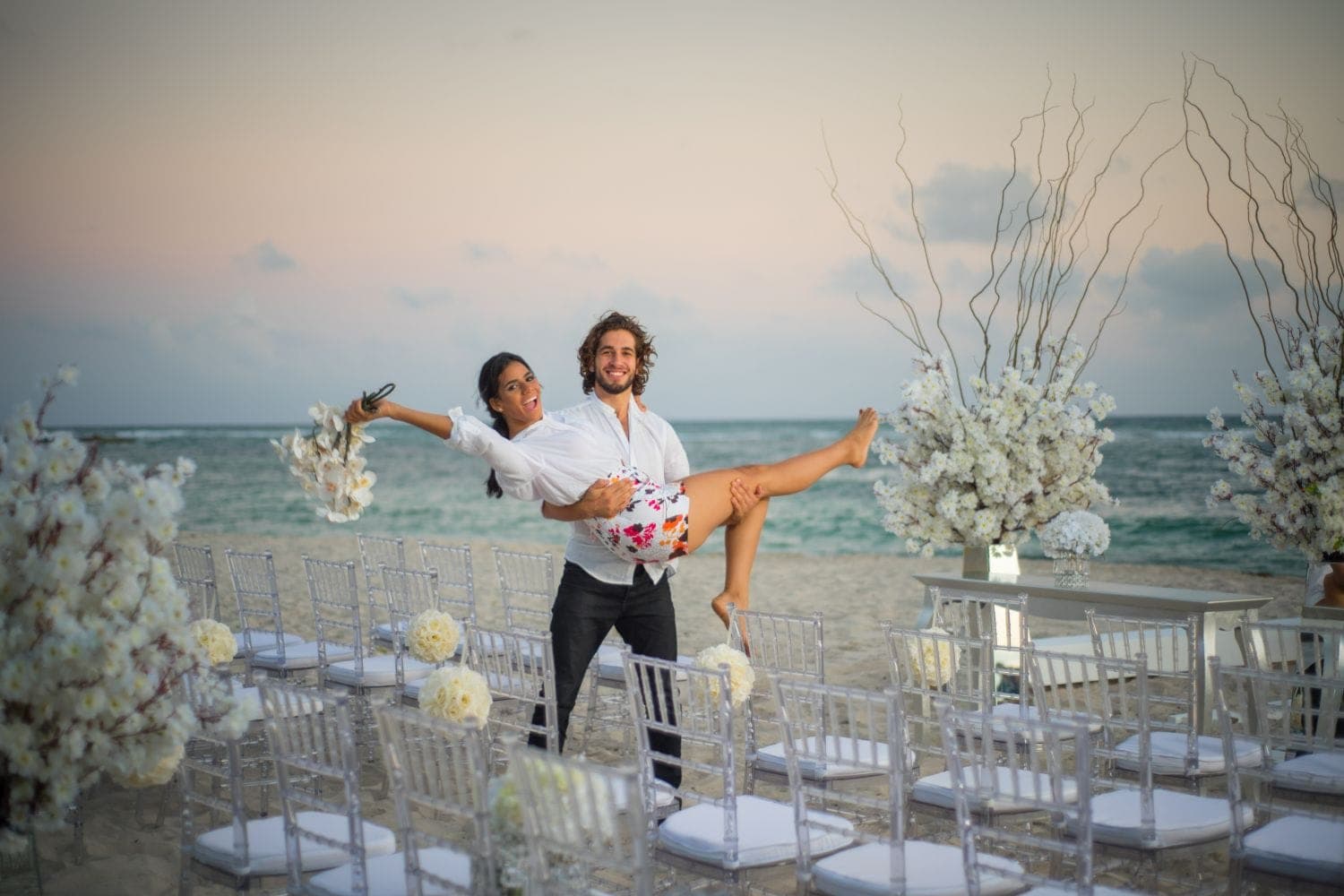Elegant wedding arch setup by the sea at Emotions Juan Dolio